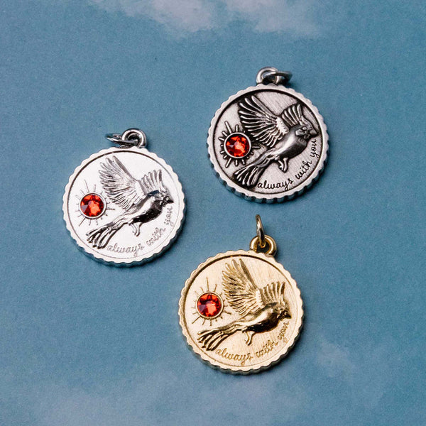 When a cardinal appears, a loved one is near. This charm holds that truth—an authentic Austrian crystal catching the light while spirit catches your attention. Wear it close and let it remind you: they're celebrating with you, just from a different place.