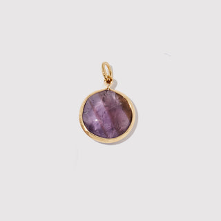 Round Amethyst Charm Gold — genuine purple gemstone symbolizing clarity and calm.