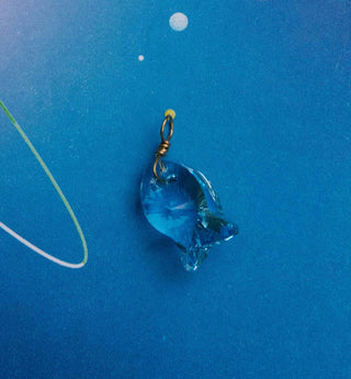The Crystal Fish Charm