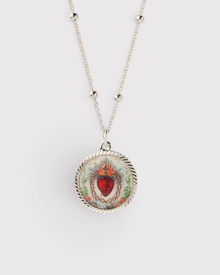 The Sacred Heart stands for Jesus’s love for humanity: wounded, wrapped in thorns, and still on fire. For generations, people carried it on holy cards tucked into wallets and prayer books.

Here, the Sacred Heart is fixed on our rosary chain with our patented expandable design, adjusting from choker to 28 inches and anywhere in between.

Love that doesn’t go out
