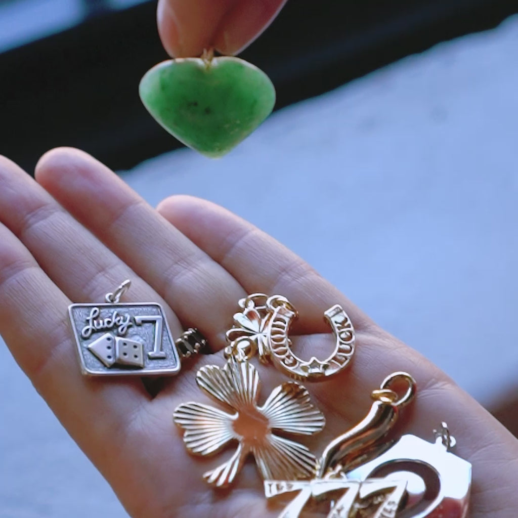 Video showcasing &LIVY Green Aventurine Heart Charm natural gemstone pendant in hand