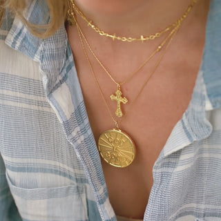 Image of gold necklaces stacked